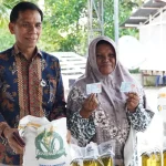 Bantuan Sosial Beras dan Minyak Goreng untuk 567 KPM di Desa Bulakan