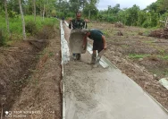 Satgas TMMD Selesaikan Pengecoran Jalan Karangmalang Tepat Waktu Meski Dihantui Awan Gelap